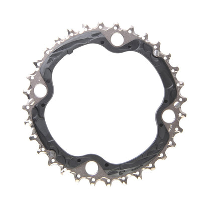 Mittleres Kettenblatt SHIMANO SLX M660/670/XT M780 10-fach, 4-Loch, 104 mm — Ansicht des Kettenblatts vor weißem Hintergrund