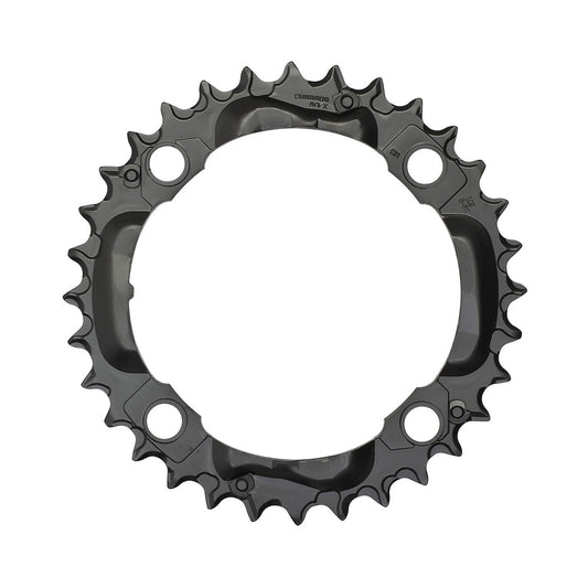 SHIMANO DEORE M590 mittleres Kettenblatt, 9-fach, 4-Loch, 104 mm, schwarz — Ansicht des Kettenblatts vor weißem Hintergrund
