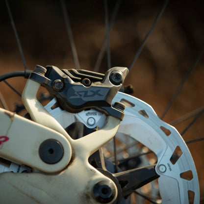 Scheibenbremssattel SHIMANO SLX M7120 4 Kolben