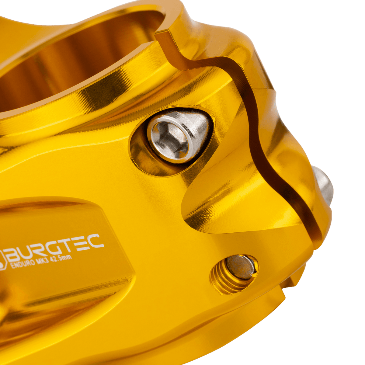 BURGTEC ENDURO MK3 Vorbau in Gold — Detail der Gabelschaftklemmung